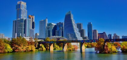 Austin city skyline with fall foliage and bridge