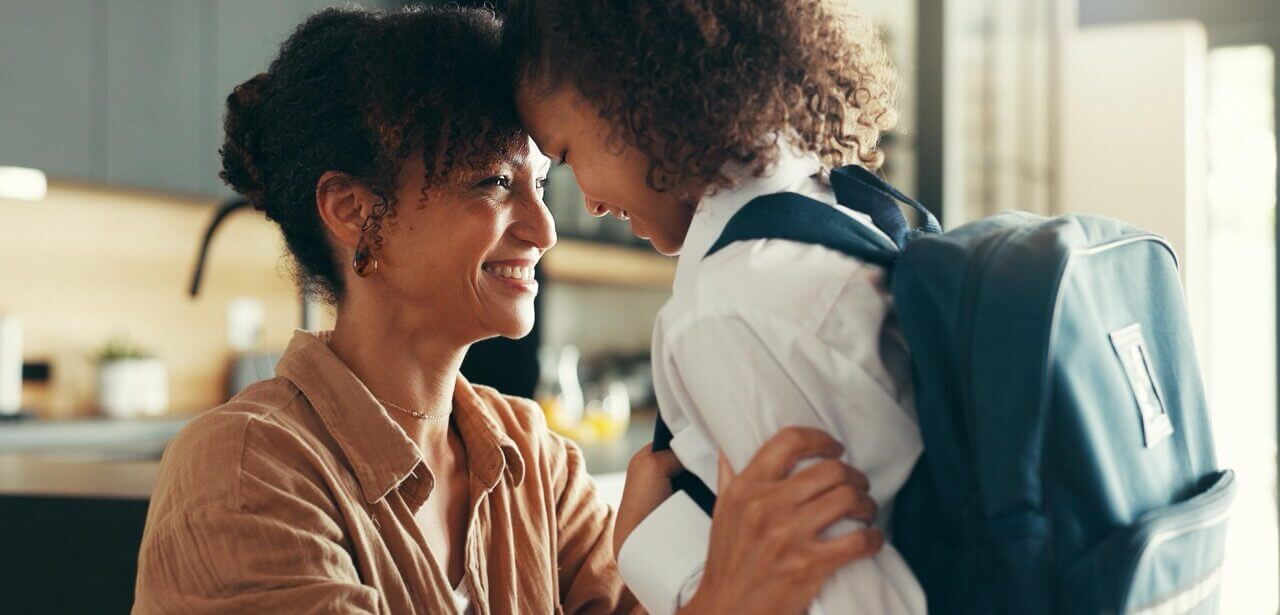 Parent prepares child for an allergy-safe school year